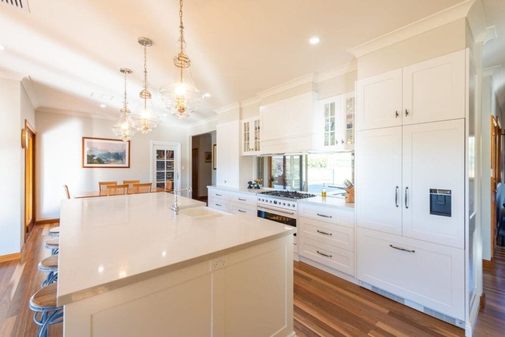 Classic mirrored Hamptons Douglas Park wide shot with kitchen island