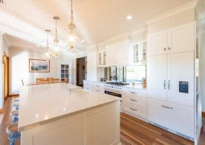 Classic mirrored Hamptons Douglas Park wide shot with kitchen island