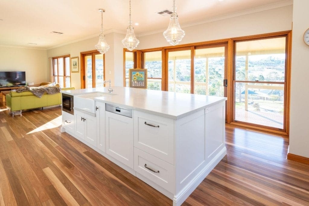 Classic mirrored Hamptons kitchen Douglas Park kitchen island bench and hanging pendant lights