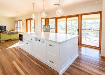 Classic mirrored Hamptons kitchen Douglas Park kitchen island bench and hanging pendant lights