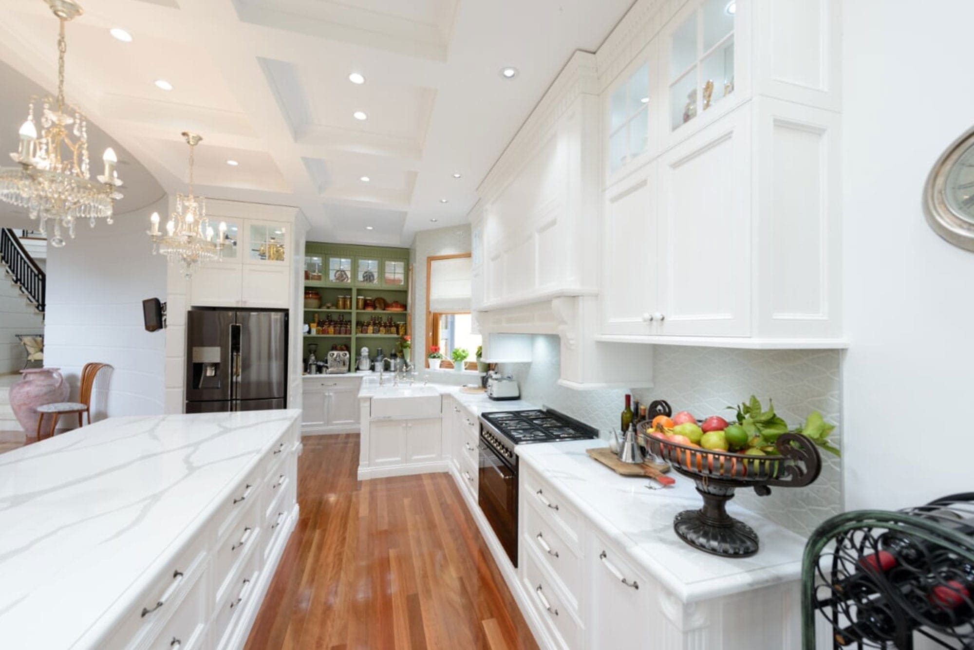 Old world bygone elegance kitchen Concord kitchen white cabinetry and green shelving