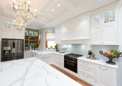 Old world bygone elegance kitchen Concord kitchen white cabinetry and green shelving
