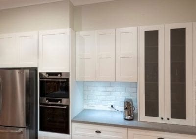 White modern kitchen Camden with subway tile splashback