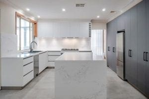 sleek black and white matte kitchen Harrington Park wide shot