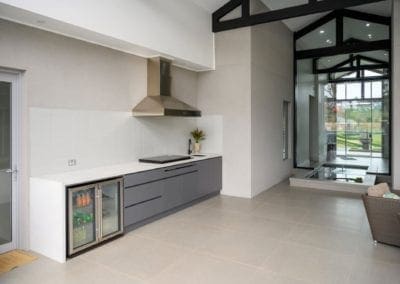 sleek streamlined stunning two toned kitchen Kirkham barbeque alfresco area