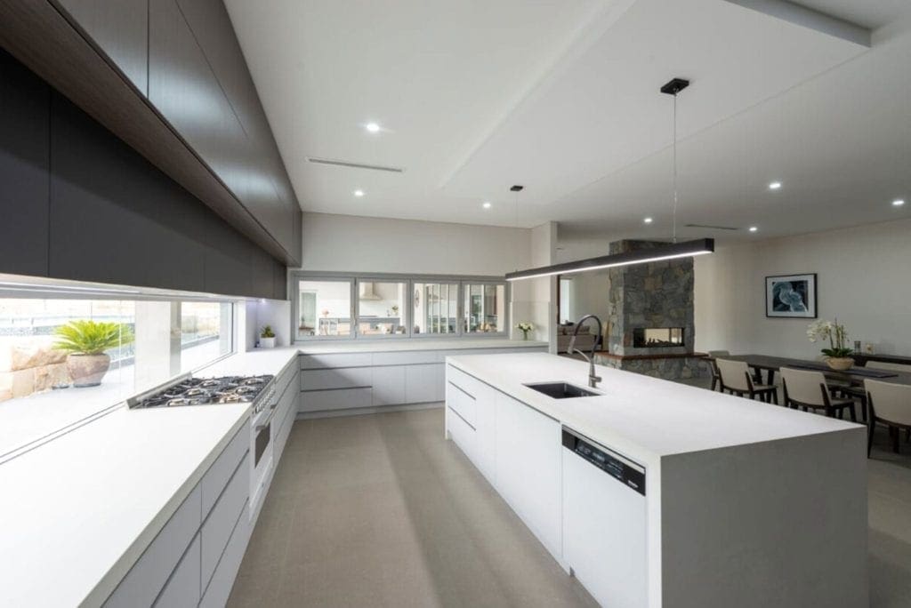 sleek streamlined stunning two toned kitchen Kirkham large cooktop run