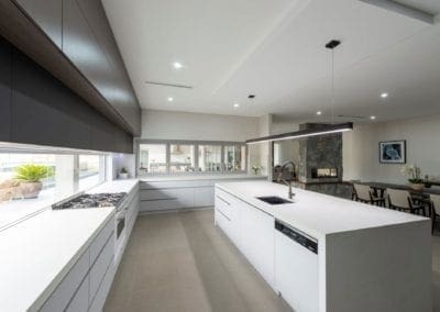 sleek streamlined stunning two toned kitchen Kirkham cooktop run
