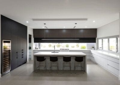 sleek streamlined stunning two toned kitchen Kirkham kitchen island bench front on view