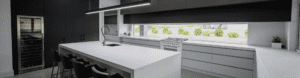 sleek streamlined stunning two toned kitchen Kirkham wide shot of kitchen island