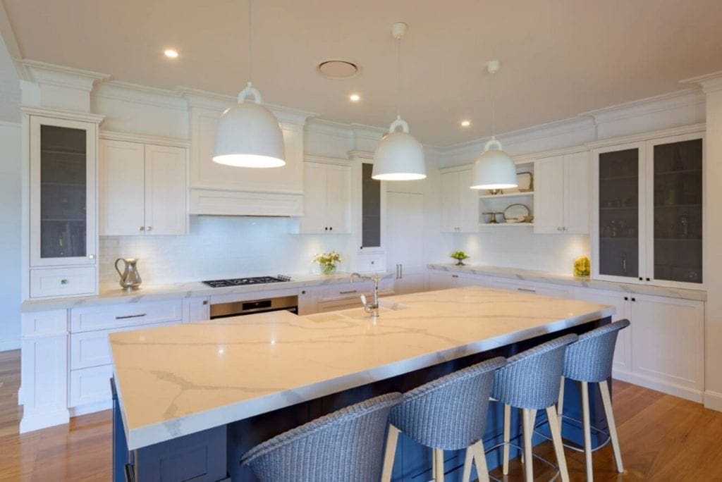 two toned white and grey kitchen orangeville kitchen island with hanging pendant lights