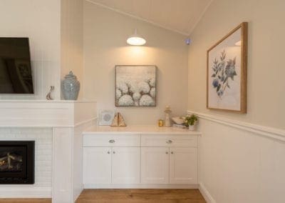 sophisticated classic hamptons style kitchen Harrington Grove living room custom cabinetry