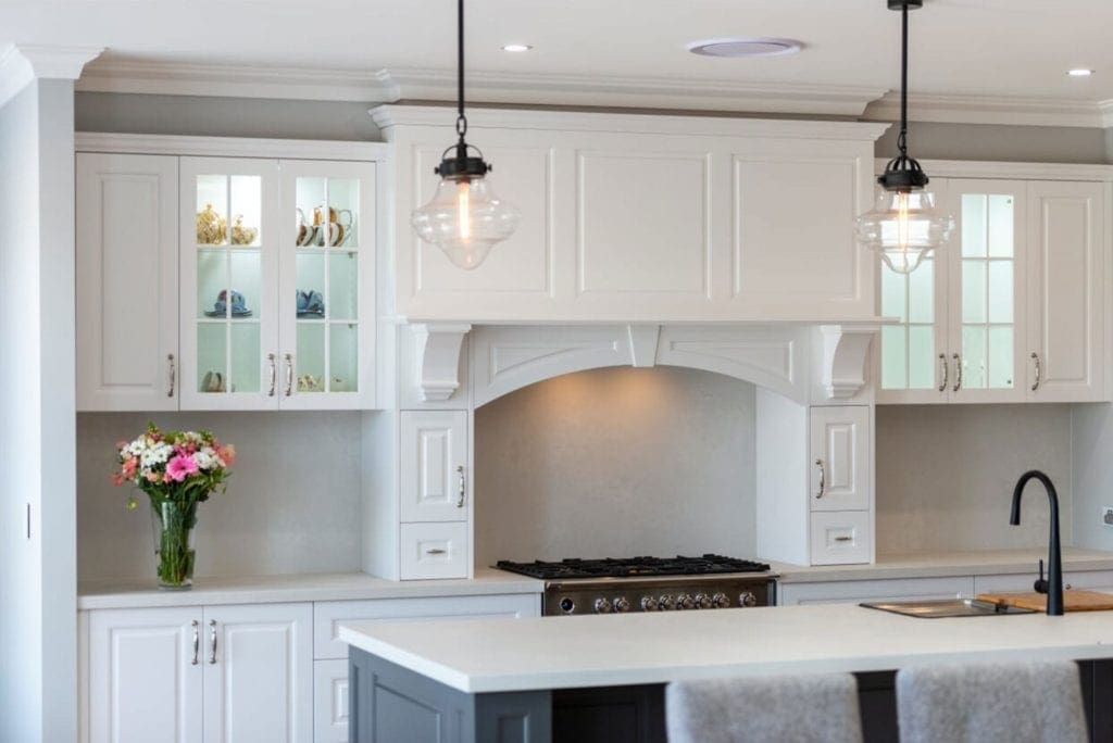 Striking two toned Hamptons kitchen Werombi surved mantle