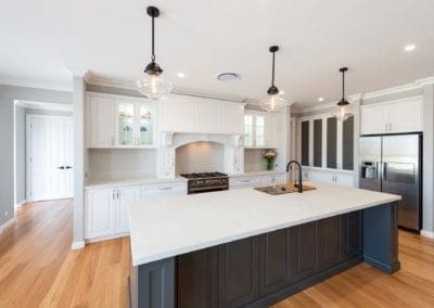 Striking two toned Hamptons kitchen Werombi kitchen island pendants