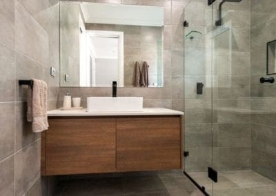 Striking two toned Hamptons kitchen Werombi main bathroom vanity with wood tones