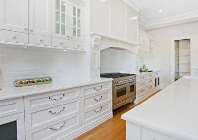 warm and refined country living kitchen outside view Warrawee kitchen cooktop run