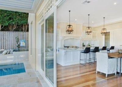 warm and refined country living kitchen outside view Warrawee outside entertaining area with a pool