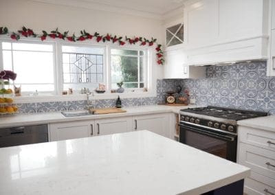 Dramatic two toned kitchen Blakehurst kitchen island stone