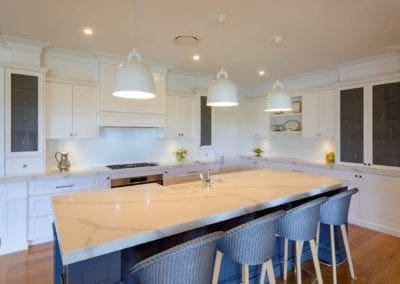 two toned white and grey kitchen orangeville kitchen island with hanging pendant lights