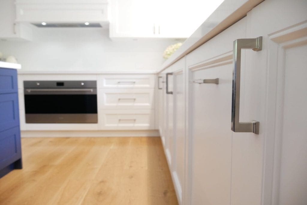 tranquil two toned family kitchen bowral silver handles close up