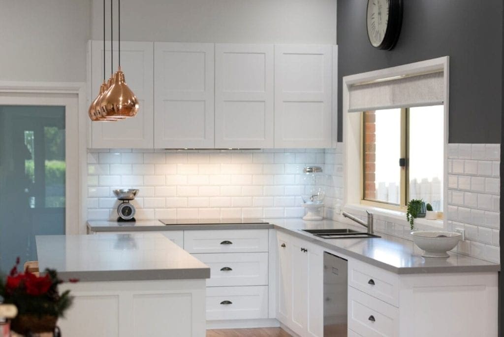 White modern kitchen with subway tile splashback