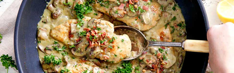 Skillet Chicken in Creamy Mushroom Sauce with Bacon and Pesto