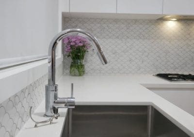 coastal feel white kitchen Narellan silver tapwear close up