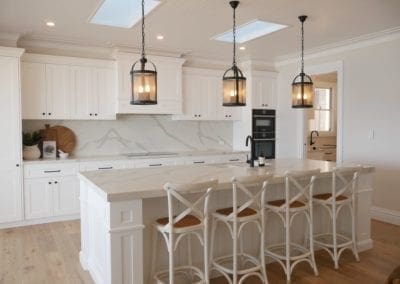 ocean glamour kitchen wombarra wide shot with white barstools