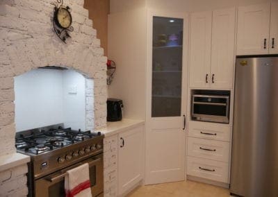 Character country filled kitchen in Mittagong with pantry and white brick