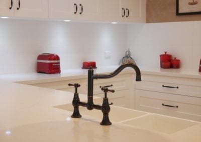 Character country filled kitchen in Mittagong brass tapwear