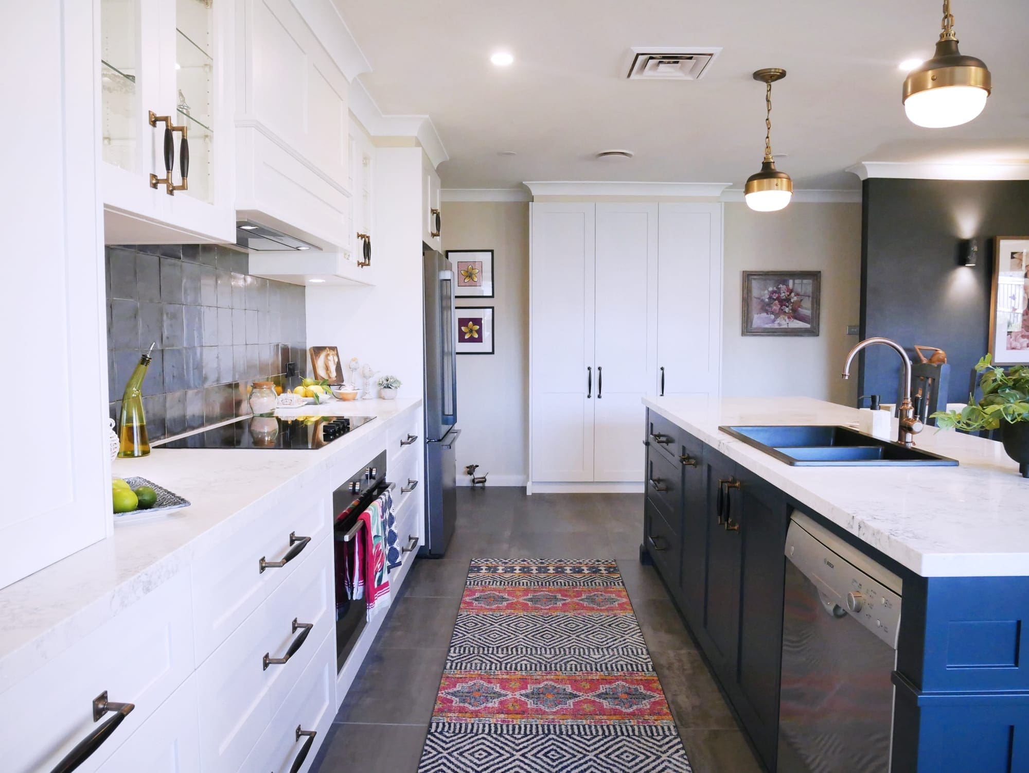 Character country filled kitchen in Mittagong white cabinetry with overhanging lights