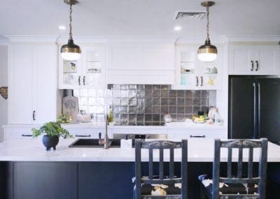 Dramatic two tones kitchen Bowral with two handing light pendants over the kitchen island