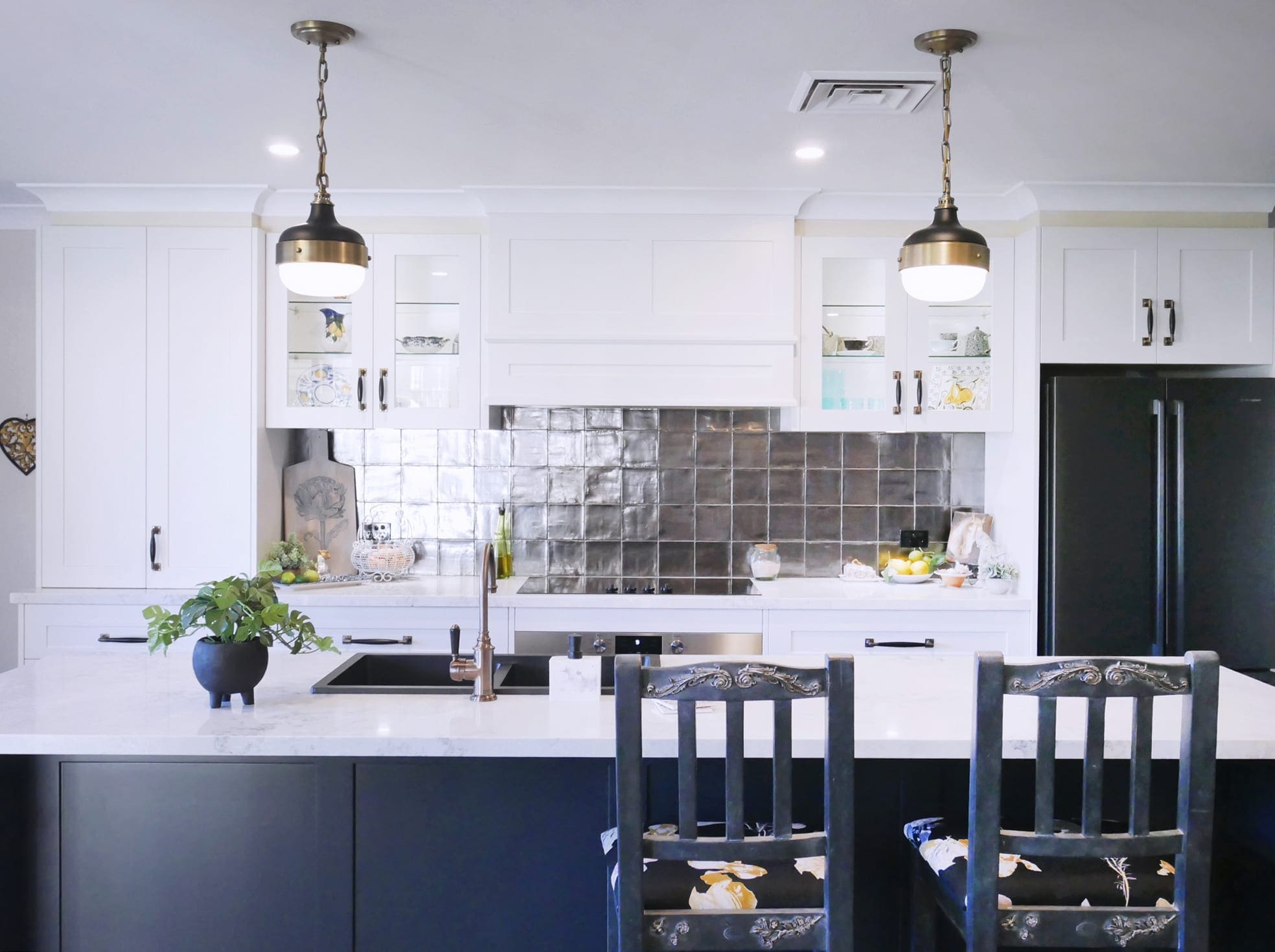 Dramatic two tones kitchen Bowral with two handing light pendants over the kitchen island