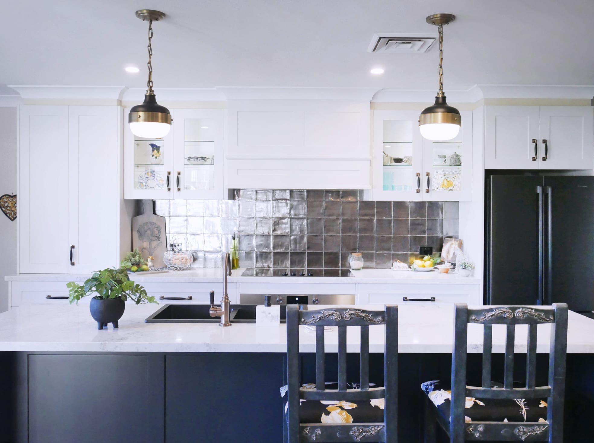 Bold-concept-with-high-class-finish-kitchen-island-Bowral Dramatic two tones kitchen Bowral with two handing light pendants over the kitchen island