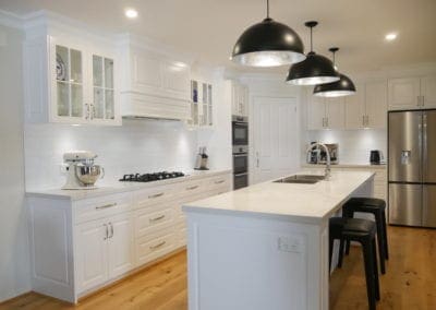 Elegant black and white Hamptons kitchen cooktop run East Bowral