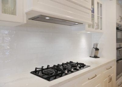 Elegant black and white Hamptons kitchen rangehood East Bowral