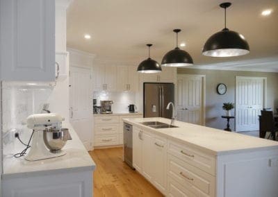 Elegant black and white Hamptons kitchen sinktop run East Bowral