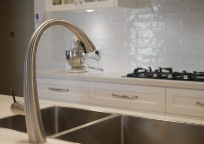 Elegant black and white Hamptons kitchen tap East Bowral