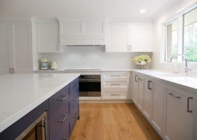 tranquil two toned family kitchen bowral custom blue and white cabinetry