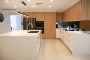 ultra modern two toned kitchen bargo mirrored splashback