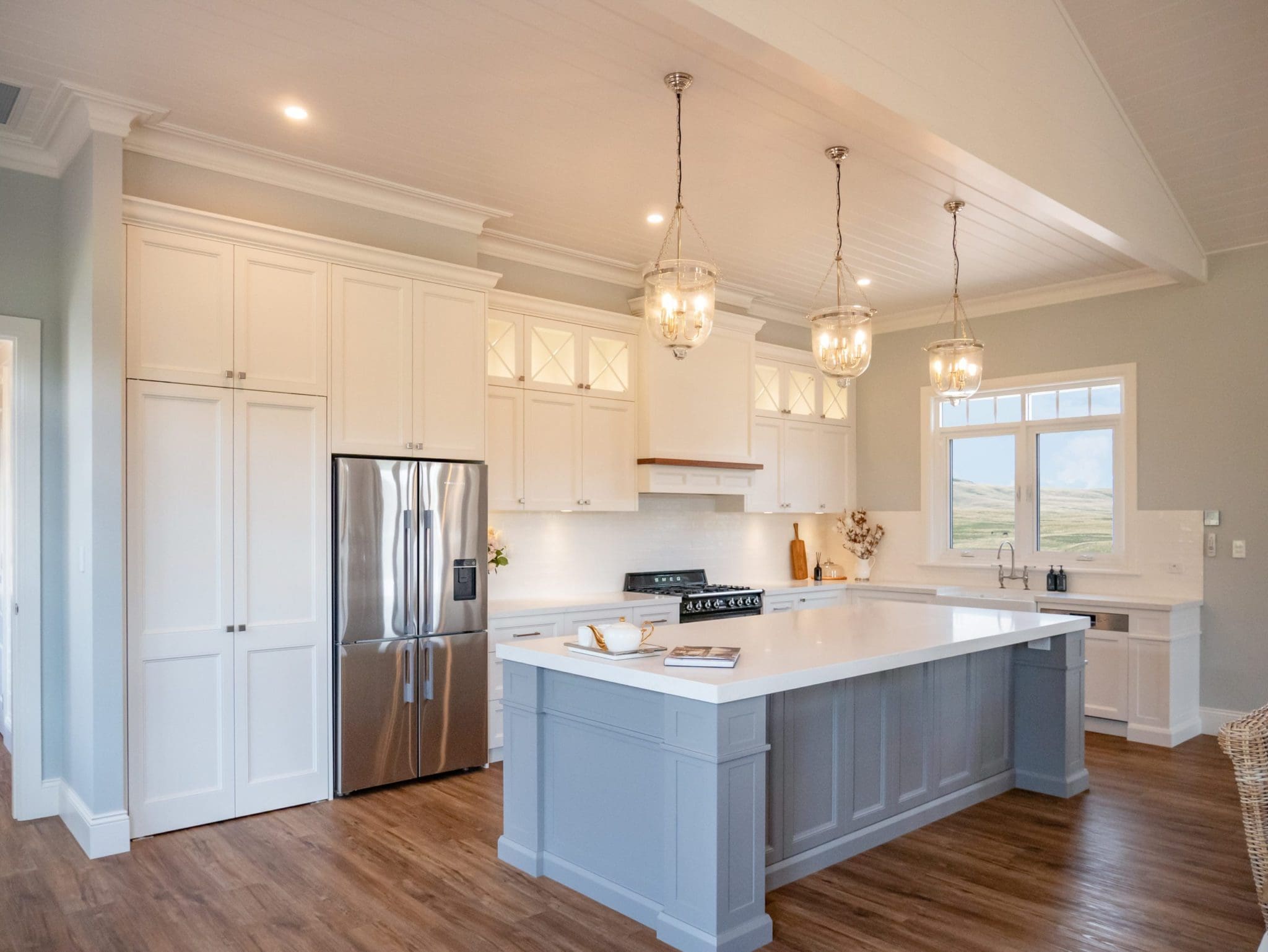 Dramatic-two-tone-kitchen-Blakehurst-wall-cabinetry breathtaking two toned kitchen exteter wide show with. greenery view our the window