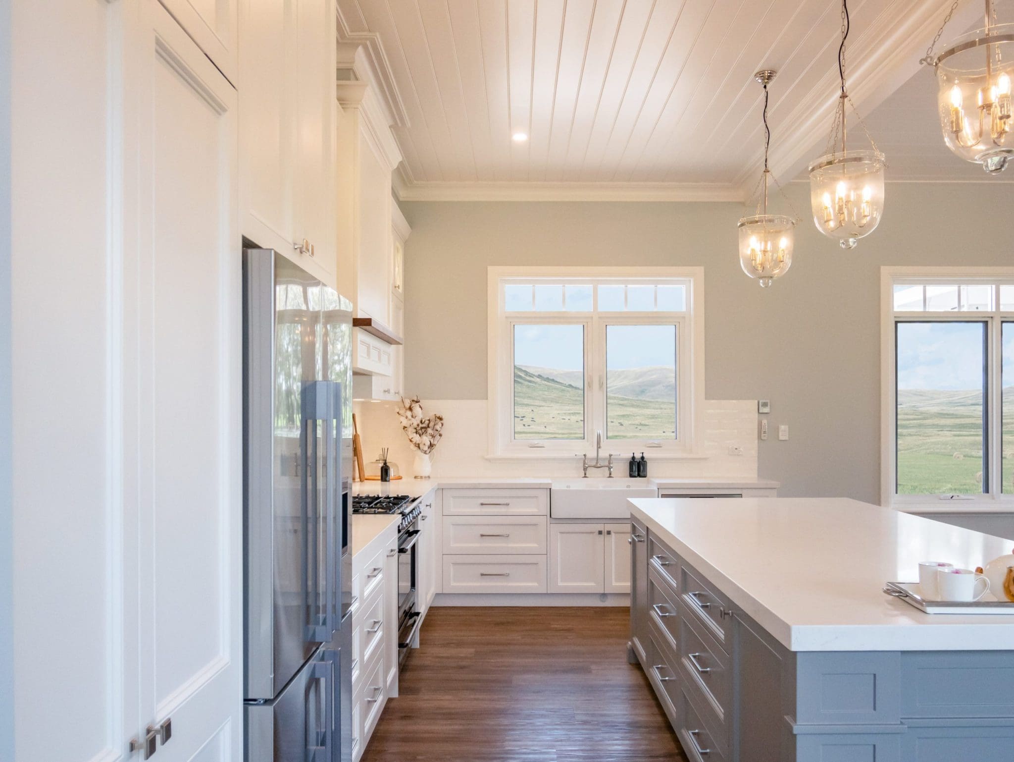 Dramatic-two-tone-kitchen-Blakehurst-dishwasher two toned kitchen Exeter with high ceilings and kitchen light pendants