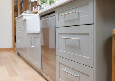 Stylish galley kitchen burradoo butlers sink and grey toned drawers