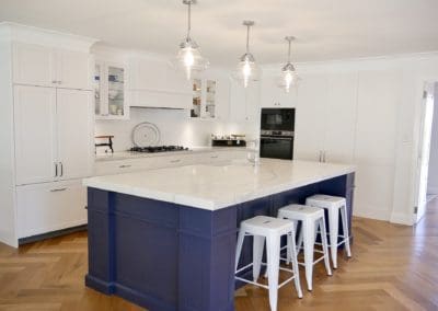 Timeless classic kitchen Moss vale with blue kitchen island white bar stools