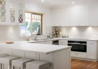 muted white and grey hamptons kitchen stone splash colo vale