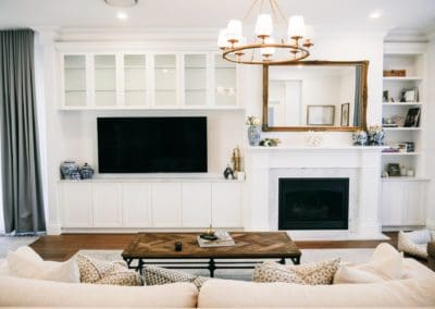 glamorous and bold two toned hamptons kitchen shell cove custom cabinetry and fire place