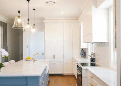 glamorous and bold two toned hamptons kitchen shell cove kitchen island and pendants