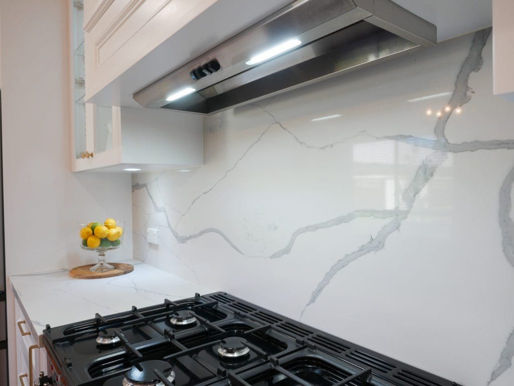 Elegant refined two toned kitchen Harrington Park stone splashback