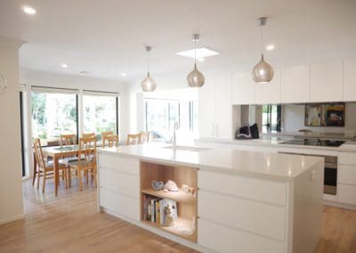 Stylish-mirrored-modern-kitchen-Burradoo-wide-shot-southern-highlands-garden-view