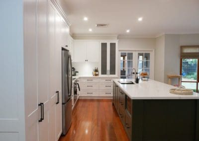 two toned luxury hamptons kitchen elderslie pantries wide shot