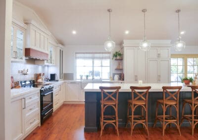 Classy Country Kitchen in Mittagong featuring hand-painted cabinetry with a unique antique finish.